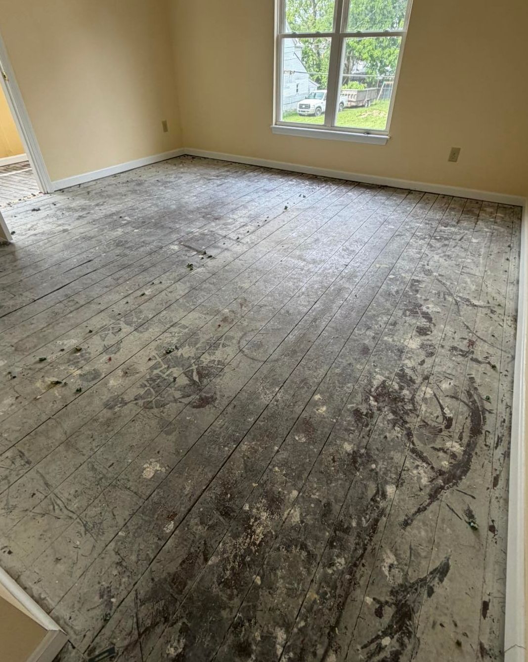 Bedroom floor before refinishing