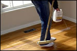 Applying stain to a hardwood floor