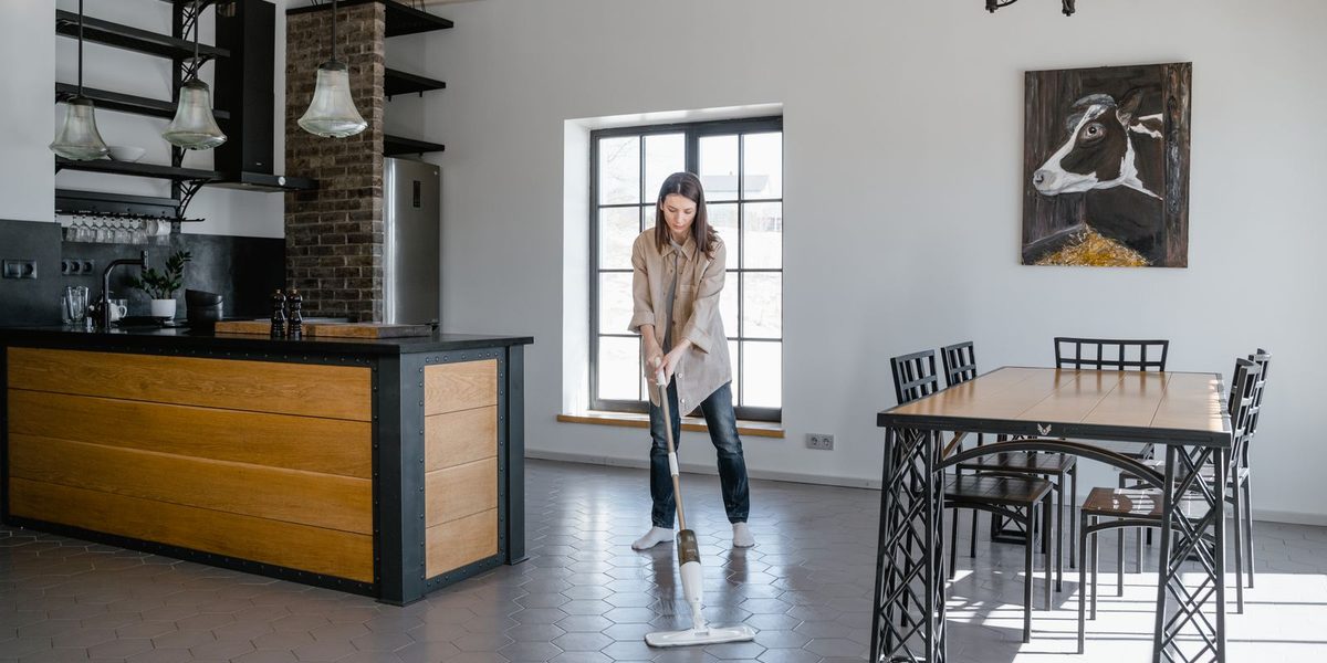 Flat mop cleaning a floor